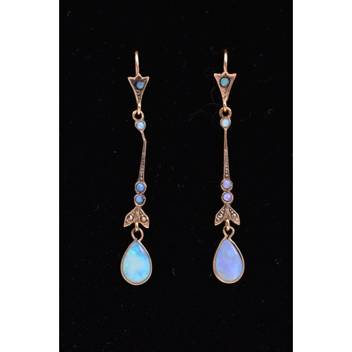 145 - A PAIR OF OPAL DROP EARRINGS, each designed as a pear shape opal cabochon suspended from a tapered l... 