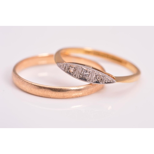 147 - TWO GOLD RINGS, one designed as a plain polished band, with 9ct hallmark for Birmingham, ring size R... 
