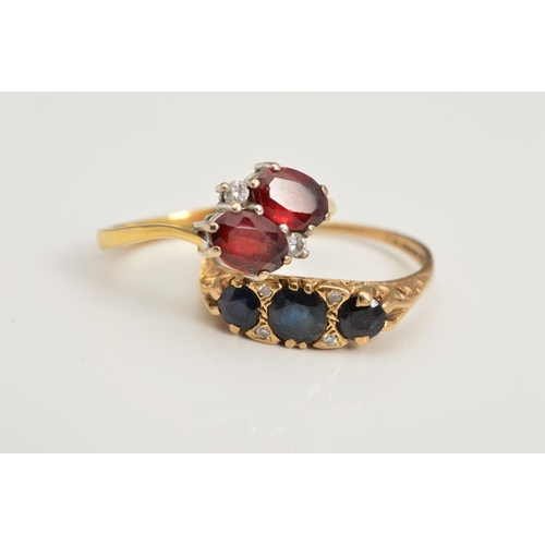 154 - TWO GEM SET RINGS, the first designed as two oval cut garnets with brilliant cut diamond detail, to ... 