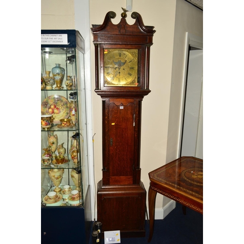 1672 - A GEORGE III OAK LONGCASE CLOCK, the broken swan neck pediment with brass rosette mounted scrolls ce... 