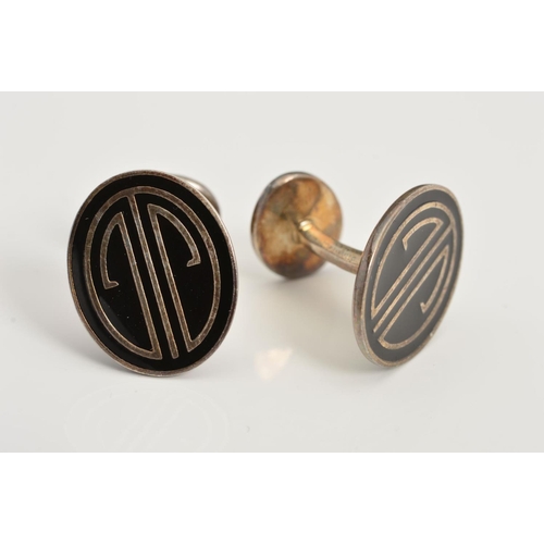 175 - A PAIR OF SILVER TIFFANY & CO CUFFLINKS, each of oval design with black cloisonne enamel detail to t... 