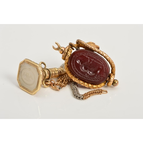 179 - A MID VICTORIAN INTAGLIO FOB, WATCH KEY AND A SWIVEL CHARM, the watch key with octagonal chalcedony ... 