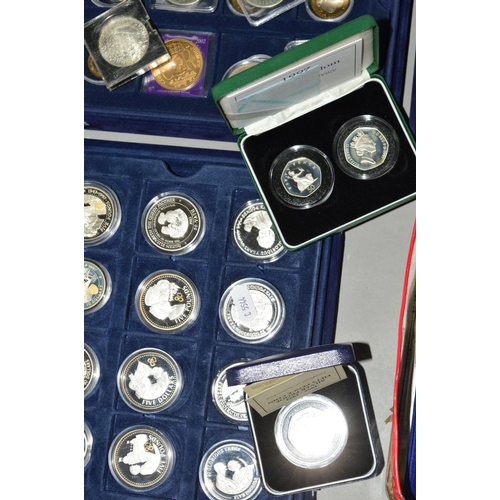 334 - FIVE COIN CASES AND A TIN OF COINS AND COMMEMORATIVES, to include many silver proofs, a rare 1992/93... 