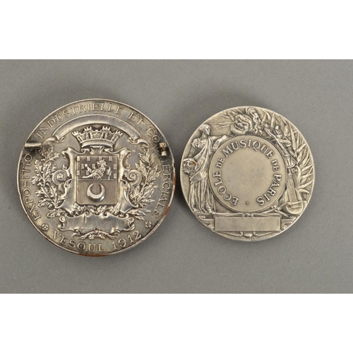 372 - TWO HEAVY GRADE WHITE METAL MEDALLIONS, both French, one is marked 'Ecole de Musique de Paris' with ... 