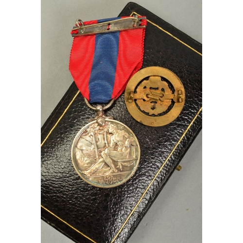 378 - A GEO V BOXED IMPERIAL SERVICE MEDAL, named John Kirkland Reid, together with a WWI era circular ena... 