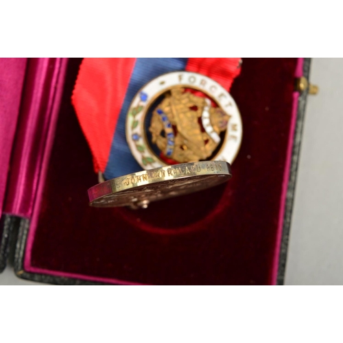 378 - A GEO V BOXED IMPERIAL SERVICE MEDAL, named John Kirkland Reid, together with a WWI era circular ena... 