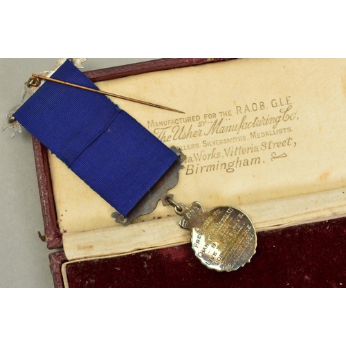 380 - A BOXED 'R.A.O.B. GLE' MEDAL, live and let live lodge, in hallmarked silver, named on the reverse to... 