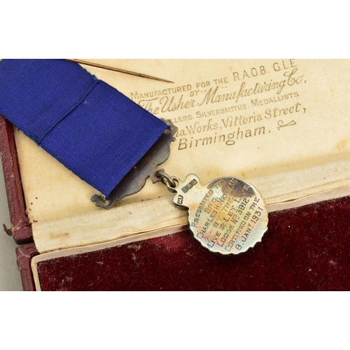 380 - A BOXED 'R.A.O.B. GLE' MEDAL, live and let live lodge, in hallmarked silver, named on the reverse to... 