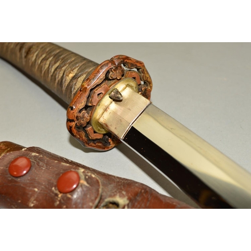 412 - A JAPANESE WWII ERA OFFICERS SAMURI SWORD, fully original in good condition in leather covered scabb... 