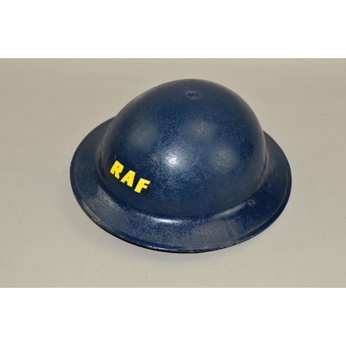 423 - AN R.O COMPANY DATED 1939 BRODIE STYLE MILITARY HELMET, with strap and liner which has been painted ... 