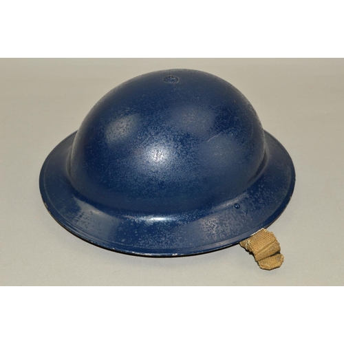 423 - AN R.O COMPANY DATED 1939 BRODIE STYLE MILITARY HELMET, with strap and liner which has been painted ... 