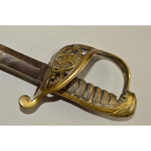 426 - A LATE BELIEVED 19TH CENTURY OFFICERS SWORD AND METAL AND LEATHER SCABBARD, which is broken in two p... 