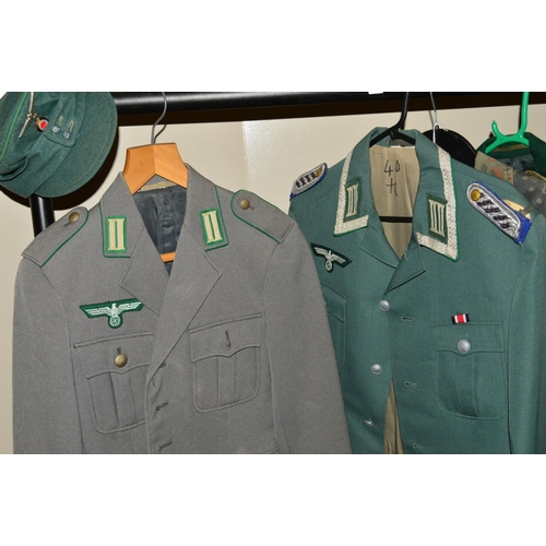 427 - FIVE ITEMS OF GERMAN MILITARY UNIFORMS, uniform jacket marked inside NVA, K, 48, 1850, T/1, the jack... 