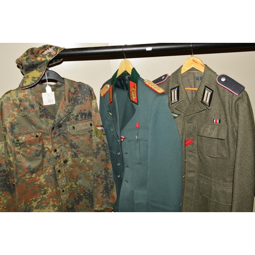 427 - FIVE ITEMS OF GERMAN MILITARY UNIFORMS, uniform jacket marked inside NVA, K, 48, 1850, T/1, the jack... 