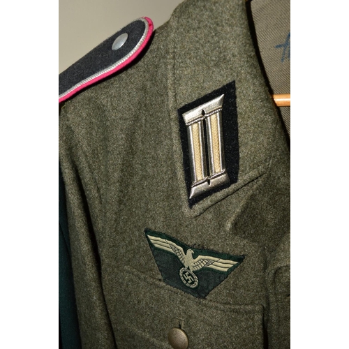 427 - FIVE ITEMS OF GERMAN MILITARY UNIFORMS, uniform jacket marked inside NVA, K, 48, 1850, T/1, the jack... 