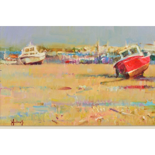 556 - HELIOS GISBERT (SPANISH CONTEMPORARY), BOATS AT LOW TIDE, beached on the sand, signed lower left, ac... 