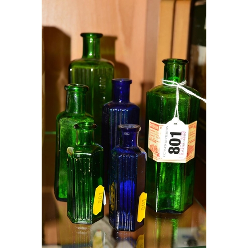 801 - SIX EARLY 20TH CENTURY MOULDED GREEN AND BLUE GLASS POISON BOTTLES, one bearing original paper label... 