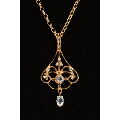 94 - A 9CT GOLD GEM PENDANT AND CHAIN, the pendant of scrolling openwork design set with aquamarines, dia... 