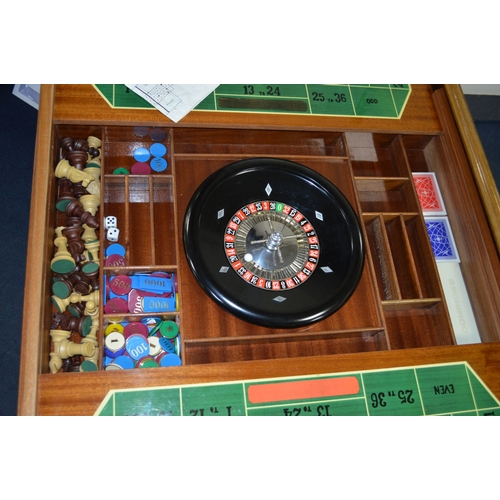 1673 - A SECOND HALF 20TH CENTURY ITALIAN MARQUETRY INLAID GAMING TABLE, on shaped square lift off top with... 