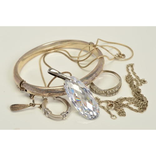 145 - A SELECTION OF SILVER AND WHITE METAL JEWELLERY, to include a hinged silver bangle, two single earri... 