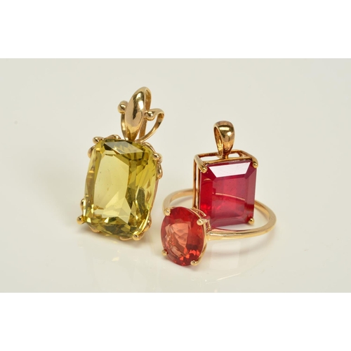 147 - A RING AND TWO PENDANTS, the ring designed as an oval shape red/orange germ assessed as andesine lab... 