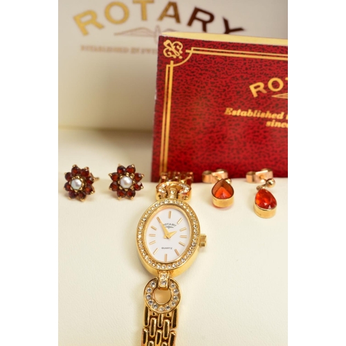 150 - TWO PAIRS OF 9CT GOLD GEM SET EARRINGS AND A CASED ROTARY WATCH, the first pair of earrings, each de... 