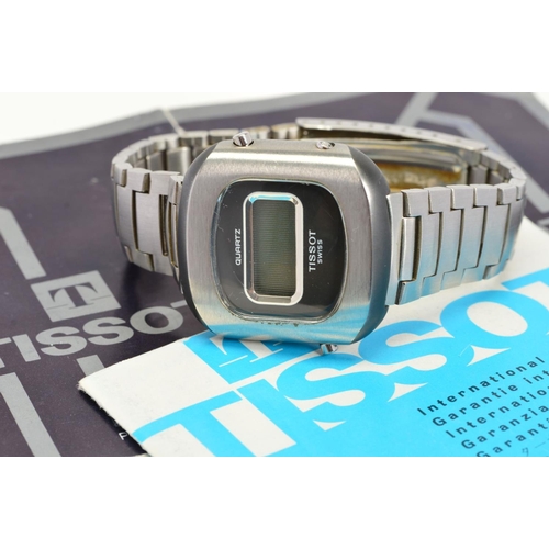 156 - A RETRO TISSOT LCD WRISTWATCH, a cushion shaped plastic and metal case with a small rectangular disp... 