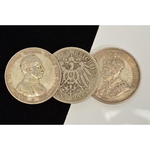 166 - THREE CROWN SIZE SILVER COINS, to include a Cyprus 1928 45 piastres coin in E.F condition, two Germa... 