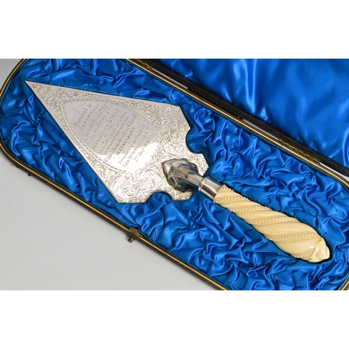 101 - A CASED LATE VICTORIAN SILVER PRESENTATION MEMORIAL STONE TROWEL, the engraved blade inscribed 'Pres... 