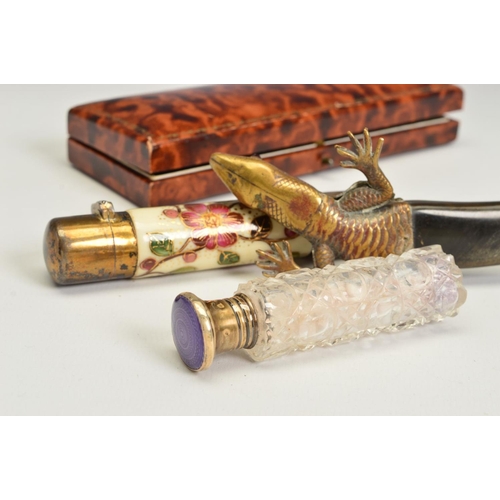 106 - A VICTORIAN SILVER GILT AND CERAMIC CYLINDRICAL DOUBLE ENDED SCENT BOTTLE, the ivory ground painted ... 