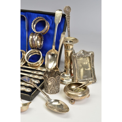 122 - A PARCEL OF SILVER, PLATE AND WHITE METAL, including a pair of George III cast silver sugar tongs, e... 