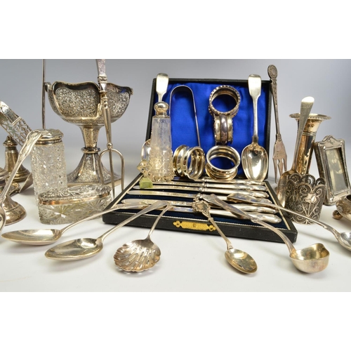 122 - A PARCEL OF SILVER, PLATE AND WHITE METAL, including a pair of George III cast silver sugar tongs, e... 