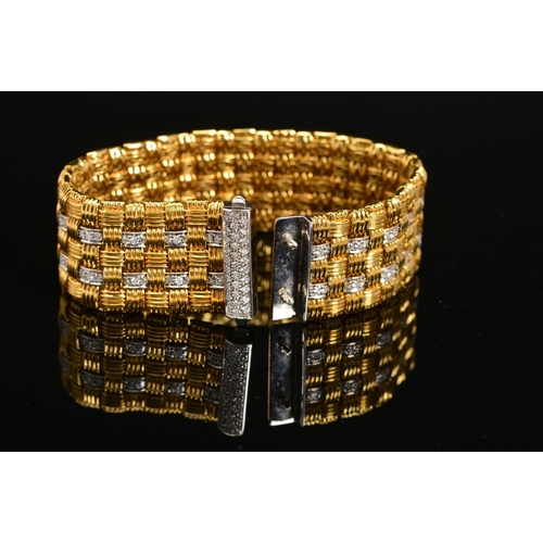 13 - A MODERN 18CT GOLD ROBERTO COIN DIAMOND BRACELET, a wide flat panel link textured pattern with diamo... 