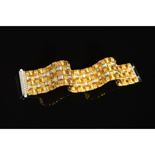 13 - A MODERN 18CT GOLD ROBERTO COIN DIAMOND BRACELET, a wide flat panel link textured pattern with diamo... 