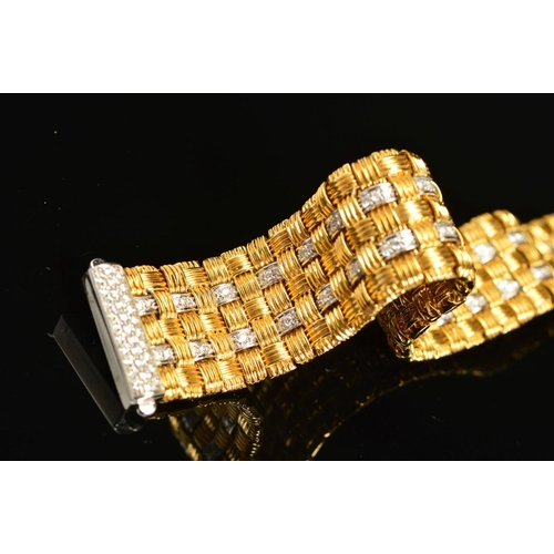 13 - A MODERN 18CT GOLD ROBERTO COIN DIAMOND BRACELET, a wide flat panel link textured pattern with diamo... 