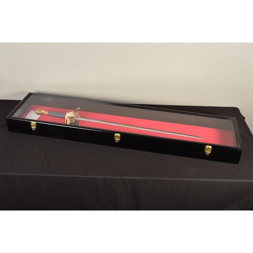 133 - A FINE LIMITED EDITION DISPLAY SWORD, contained in a handmade display case commemorating the 50th An... 