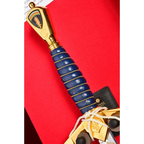 133 - A FINE LIMITED EDITION DISPLAY SWORD, contained in a handmade display case commemorating the 50th An... 