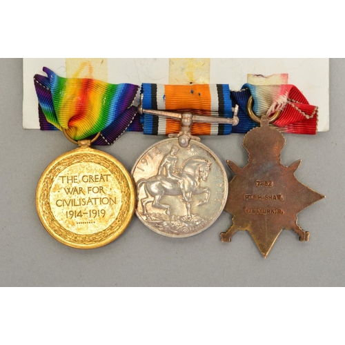 140 - A WWII 1914 STAR TRIO OF MEDALS, named 7262 Pte Henry Shaw 1st West York Regiment, mounted on card, ... 