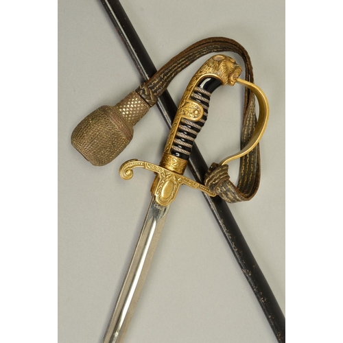 143 - A WWII ERA 3RD REICH OFFICERS SWORD AND SCABBARD, the design is the 'Lions Head' style with red colo... 