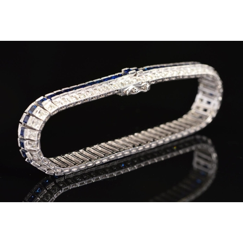 16 - A MODERN SAPPHIRE AND DIAMOND LINE BRACELET, centring on a line of calibre square cut blue sapphires... 