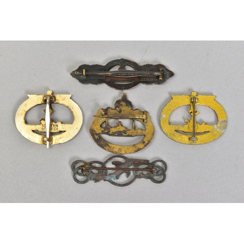 161 - FIVE BADGES AND CLASPS, of German WWII Kreigsmarine U boat interest consisting of gold coloured U bo... 