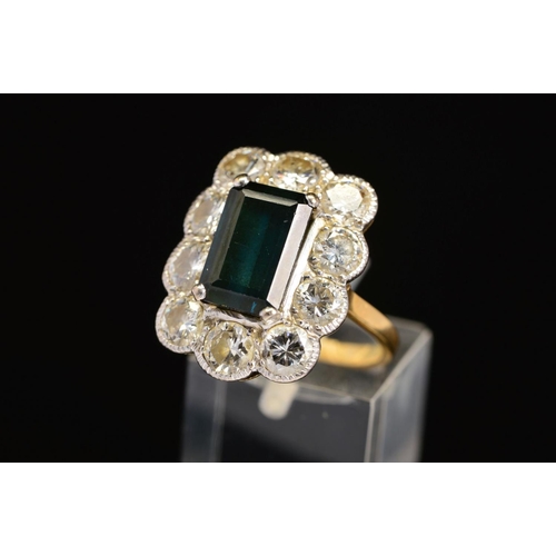 17 - A LARGE 18CT GOLD DIAMOND AND DARK GREEN TOURMALINE CLUSTER RING, emerald cut tourmaline measuring a... 