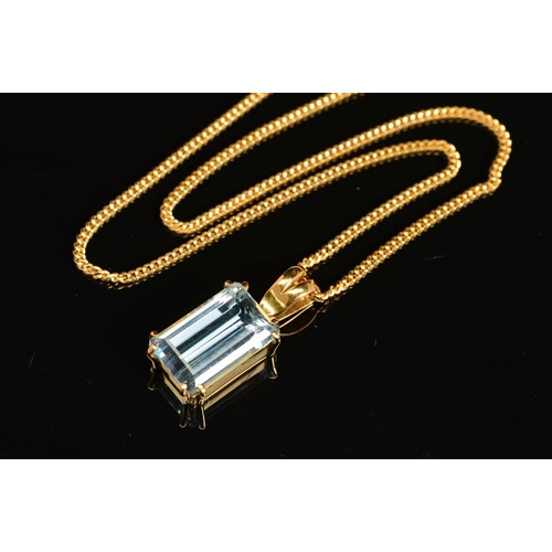 22 - A MODERN 18CT AQUAMARINE PENDANT AND CHAIN, one emerald cut aquamarine measuring 18mm x 11.5mm x 7.9... 