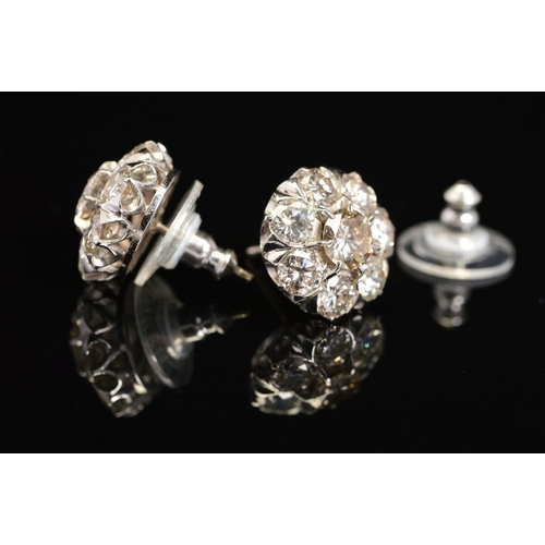 26 - A PAIR OF MODERN DIAMOND ROUND CLUSTER EAR STUDS, post fittings, round brilliant cut diamonds measur... 