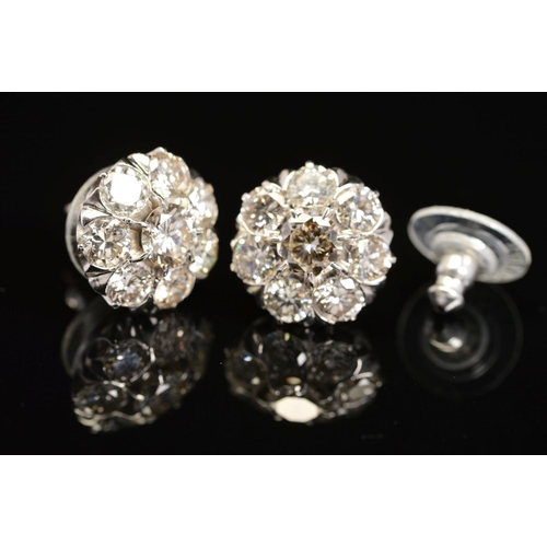 26 - A PAIR OF MODERN DIAMOND ROUND CLUSTER EAR STUDS, post fittings, round brilliant cut diamonds measur... 