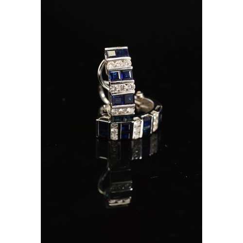 32 - A PAIR OF MODERN SAPPHIRE AND DIAMOND HOOP STYLE EARRINGS, post and omega clip fitting, comprised sq... 