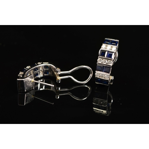 32 - A PAIR OF MODERN SAPPHIRE AND DIAMOND HOOP STYLE EARRINGS, post and omega clip fitting, comprised sq... 