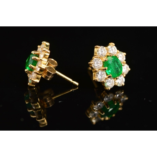 35 - A PAIR OF LATE 20TH CENTURY EMERALD AND DIAMOND STUD EARRINGS, post and scroll fittings, emeralds me... 