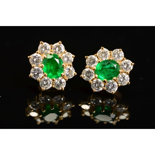 35 - A PAIR OF LATE 20TH CENTURY EMERALD AND DIAMOND STUD EARRINGS, post and scroll fittings, emeralds me... 