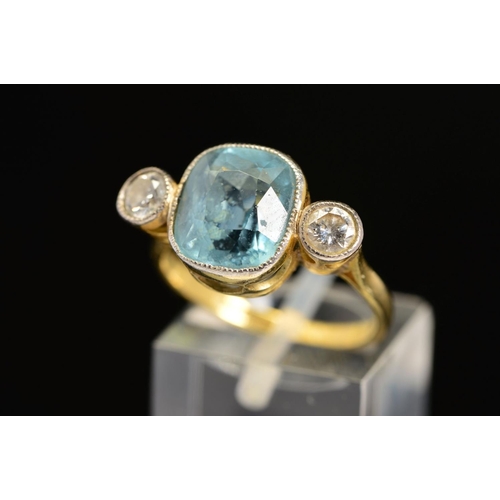 39 - A MID TO LATE 20TH CENTURY AQUAMARINE AND DIAMOND THREE STONE RING, centring on a cushion mixed cut ... 